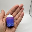 469042597_122131485722441744_7148605131136251741_n.jpg Happy Boba Clicky Fidget and Keychain