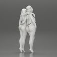 3DG-0009.jpg Two girl in bikini hugging on the beach