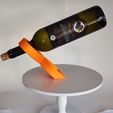 Sand_Timer_Wine_Bottle_Holder21.jpg Hourglass sand timer shaped balanced bottle holder