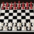 Complete_board_A.jpg Chess pieces with board