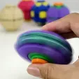 4e0fc12476630141.webp HelixCore – Press-to-Spin Squishy Ball