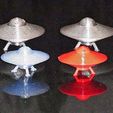alien-invasion_display_large.jpg UFO with Spinning Outer Disk