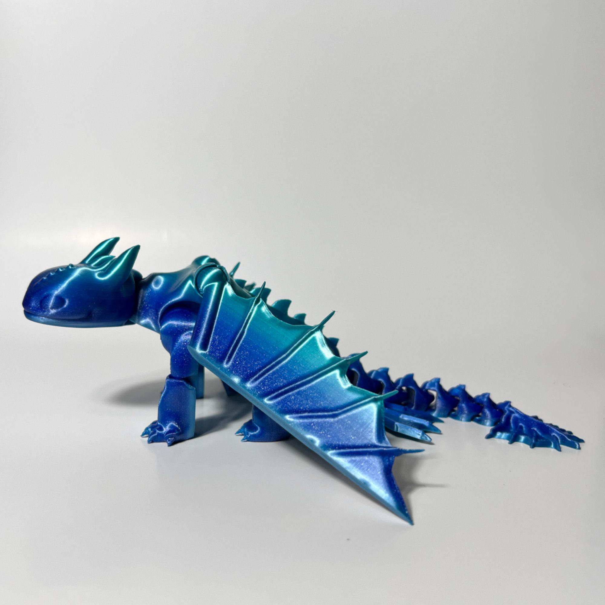 Blue_Toothless.jpg Fichier STL gratuit Dragon sans dents Flexi・Plan imprimable en 3D à télécharger, Saber3D