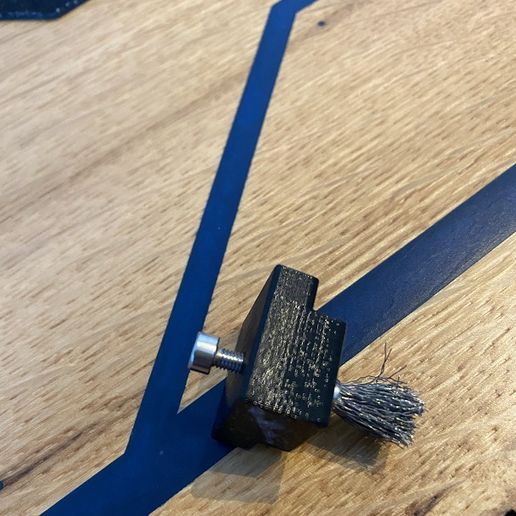 Automatic nozzle cleaning station
