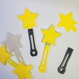 20240109_095415.jpg Cosmic Clapper Star-Shaped Noisemaker Party Favor Toy