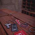 IMG_1074.jpg-Fotos.jpg Glee Keychain - Cheerleader Logo - Santana