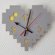 7c03f88498108e74e8e0fb4a40a750a2_preview_featured.jpg Pixel Heart Wall Clock