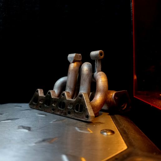Phone stand- exhaust manifold