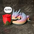 20240103_221936.jpg Dragon baby with a rose for Valentine's Day